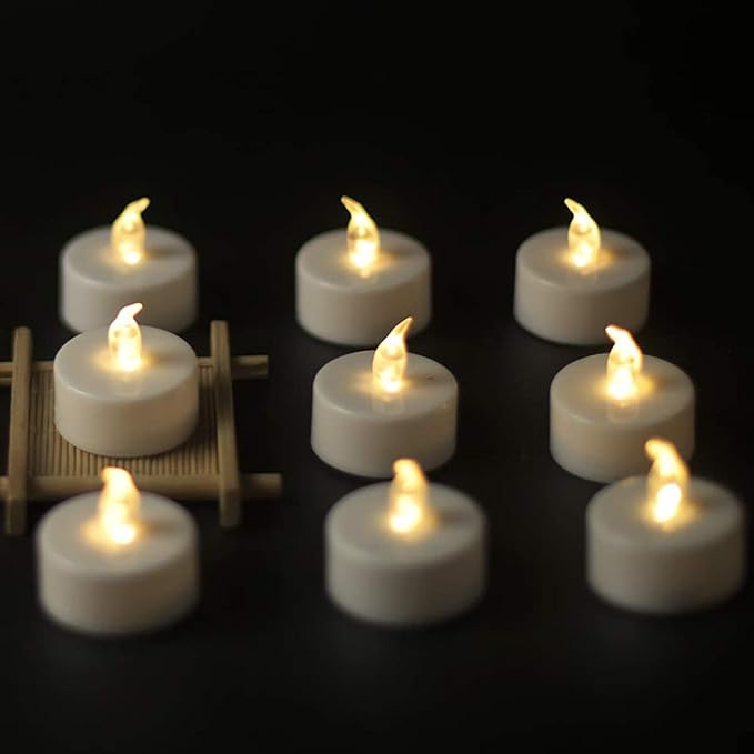 YIWER Battery Tea Lights Candles Set of 24: Flickering flameless Realistic Tealights with Warm White Light Candle Light for Festivals Parties Halloween Warm Atmosphere