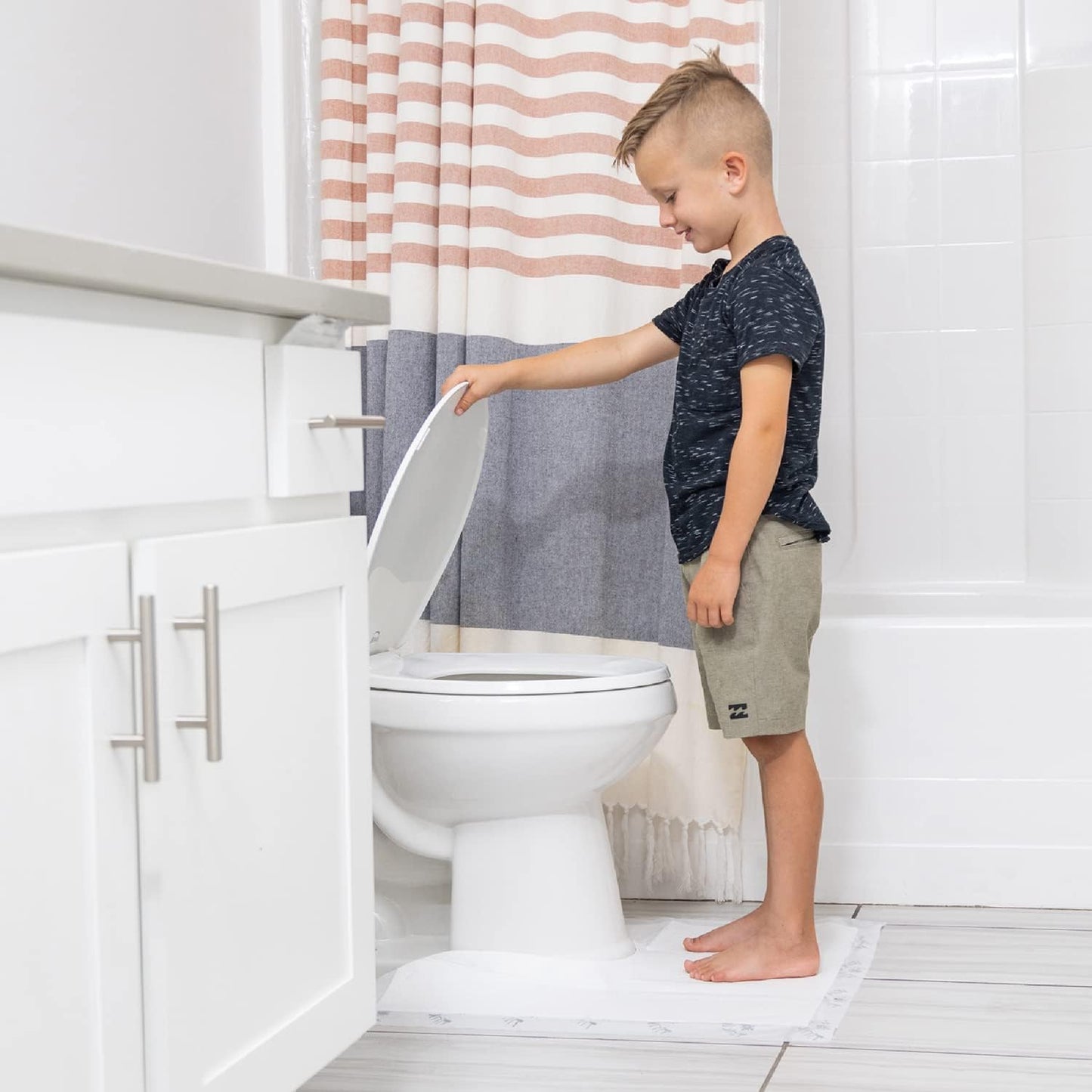 Tinkle Mat Disposable Toilet Commode Mat – Super Absorbent, Deodorizing Toilet Mats for Bathroom U Shaped – Great for Kid Potty Training, Incontinence & More – 24 x 24 Inches, 20 Pack, Lavender