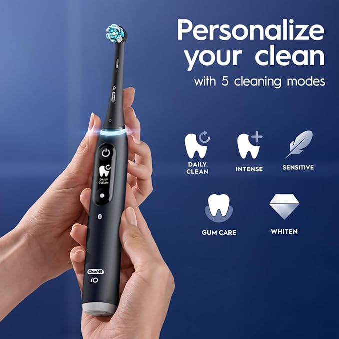 Oral-B iO Deep Clean + Protect Rechargeable Electric Toothbrush, Black with a iO Series 7 Toothbrush, 2 Replacement Brush Heads, and a Charging Travel Case