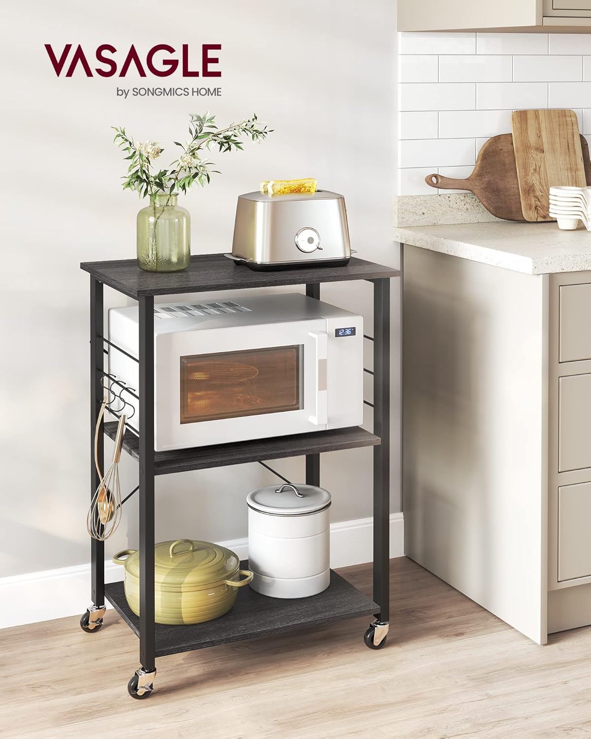 VASAGLE Kitchen Shelf on Wheels, Serving Cart with 3 Shelves, Kitchen Cart, Microwave Shelf, for Mini Oven, Toaster, with 6 Hooks, Industrial Stylee, Ebonized Oak Finish and Black UKKS060B42