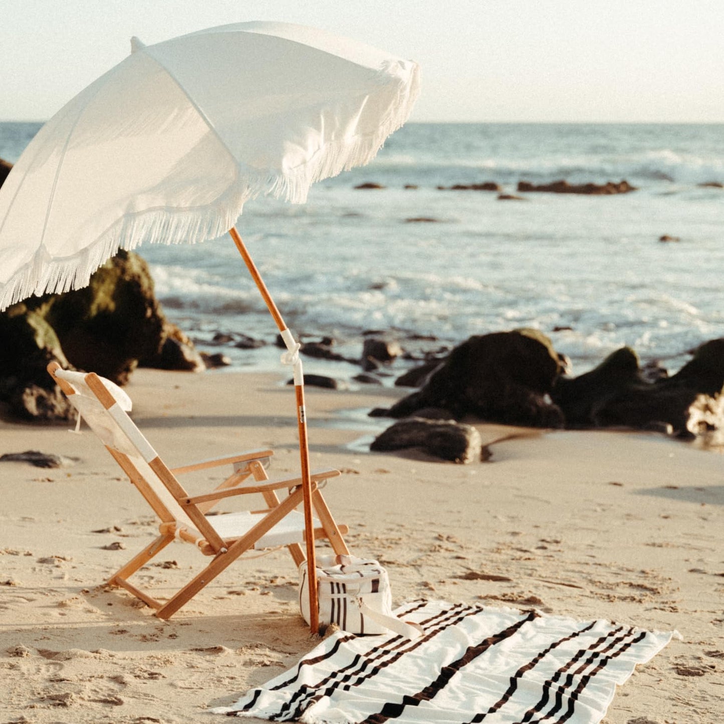 Business & Pleasure Co. Holiday Umbrella - Boho Beach Umbrella with White Fringe, UPF 50+, 1" Tilting Wood Pole, 5’ x 6.5’, Antique White