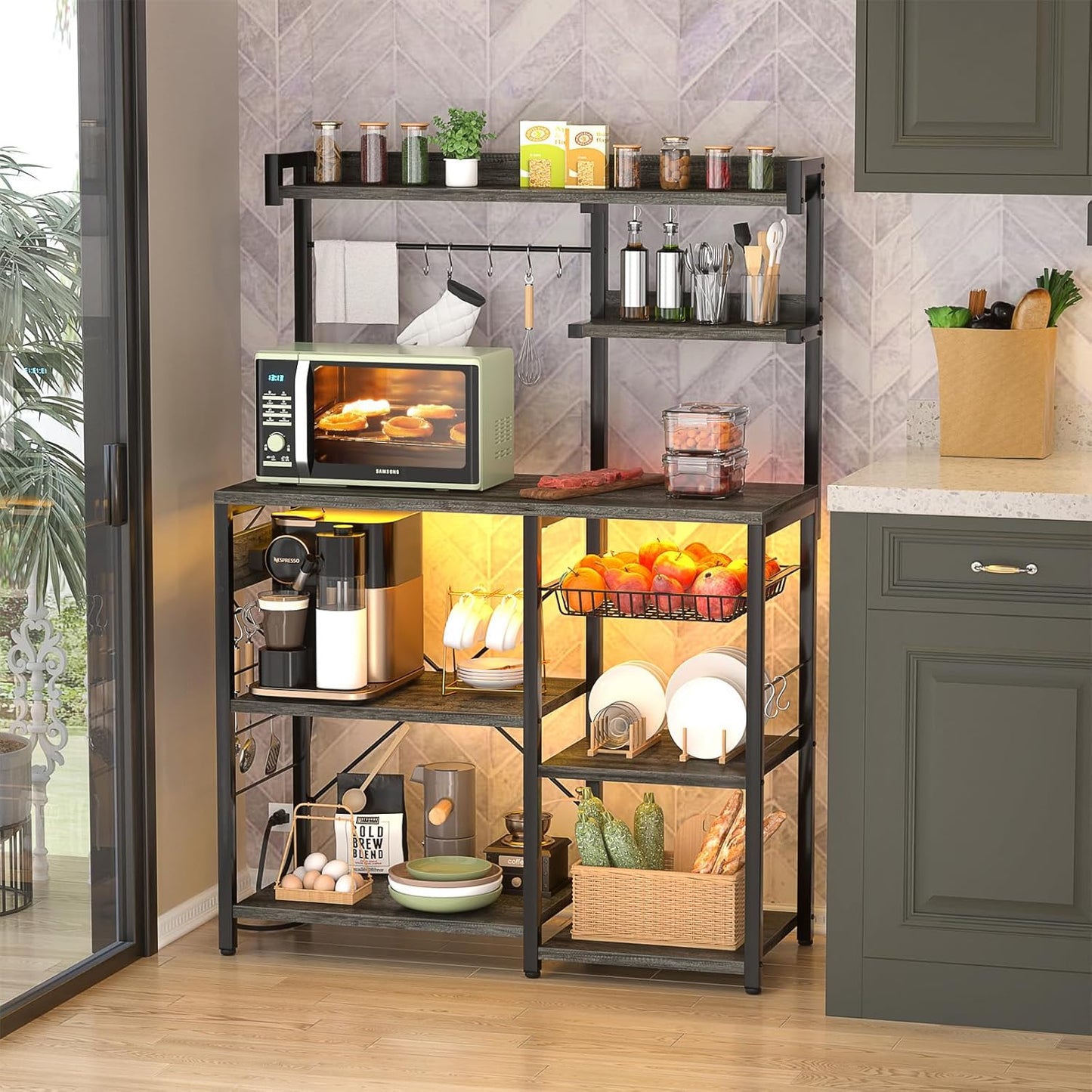Aheaplus Bakers Rack with Power Outlet and LED Light Strings, Microwave Oven Stand Kitchen Storage Shelf with Wire Basket, Coffee Bar Station Island Table with 10 Hooks for Spices, Pots, Black Oak