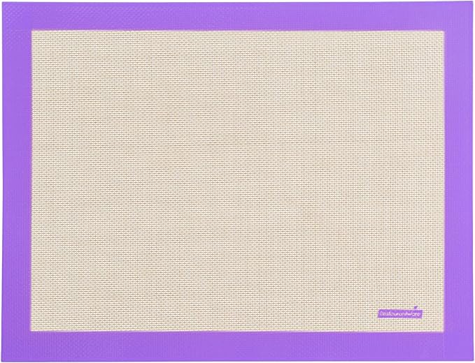 Restaurantware Half Size Baking Mat 1 Heat-Resistant Cooking Mat - Allergen-Safe Reusable And Ultra-Durable Tan And Purple Silicone Nonstick Mat For Pans And Rolling 11.8 x 15.75 Inch