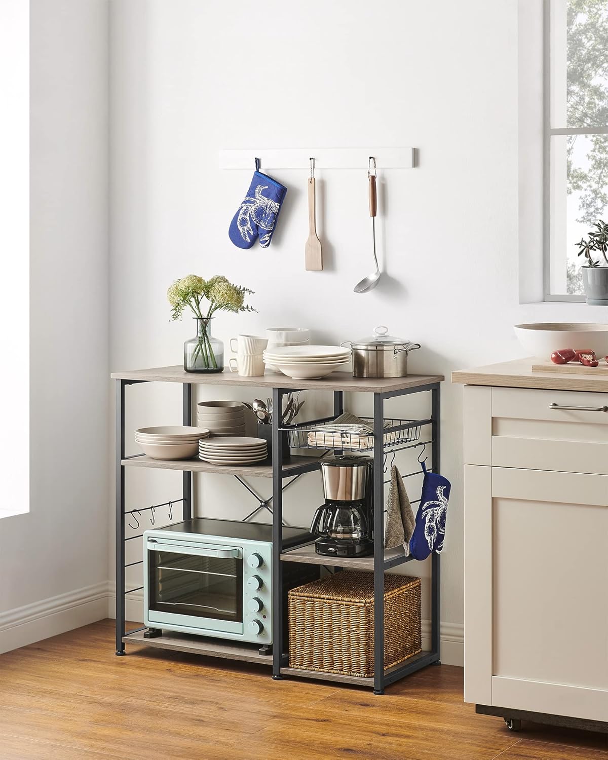 VASAGLE ALINRU Kitchen Baker’s Rack, Coffee Bar, Microwave Oven Stand, with Steel Frame, Wire Basket, 6 Hooks, for Mini Oven, Spices Utensils, Industrial, Greige and Black UKKS090B02