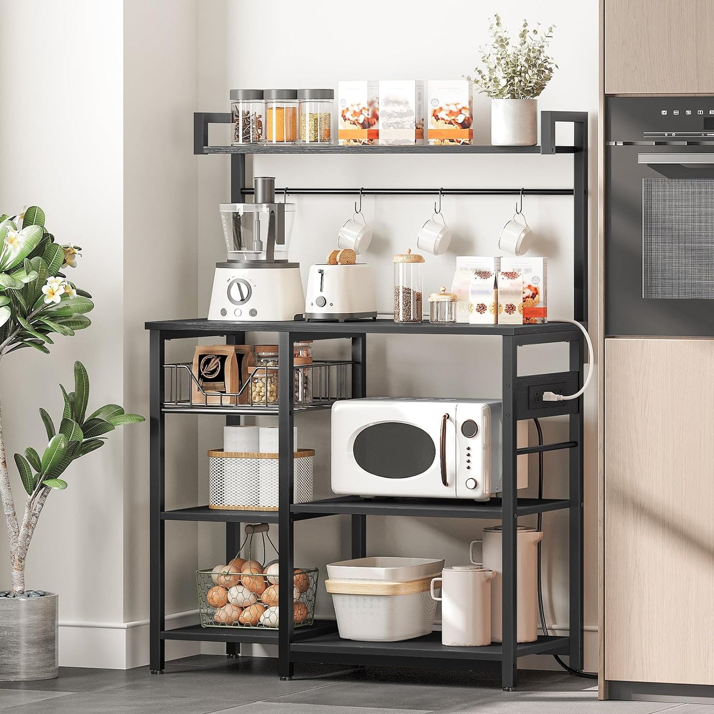 HOOBRO Kitchen Bakers Rack with Power Outlet, Coffee Bar, Microwave Oven Stand with Mesh Basket, Coffee Station with 4 S-Shaped Hook, Kitchen Shelf, for Dining Room, Living Room, Black BB05HB01