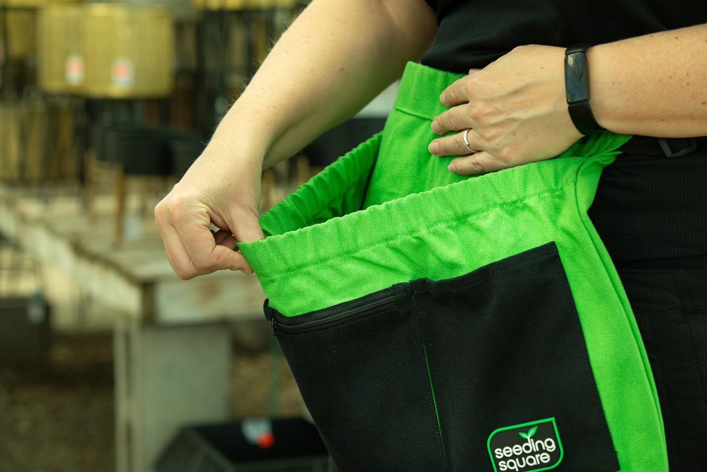 Seeding Square Harvest Garden Apron – pick fruits, vegetables, eggs and weeds & store small tools, seeds and personal items (Green Pockets on Black)