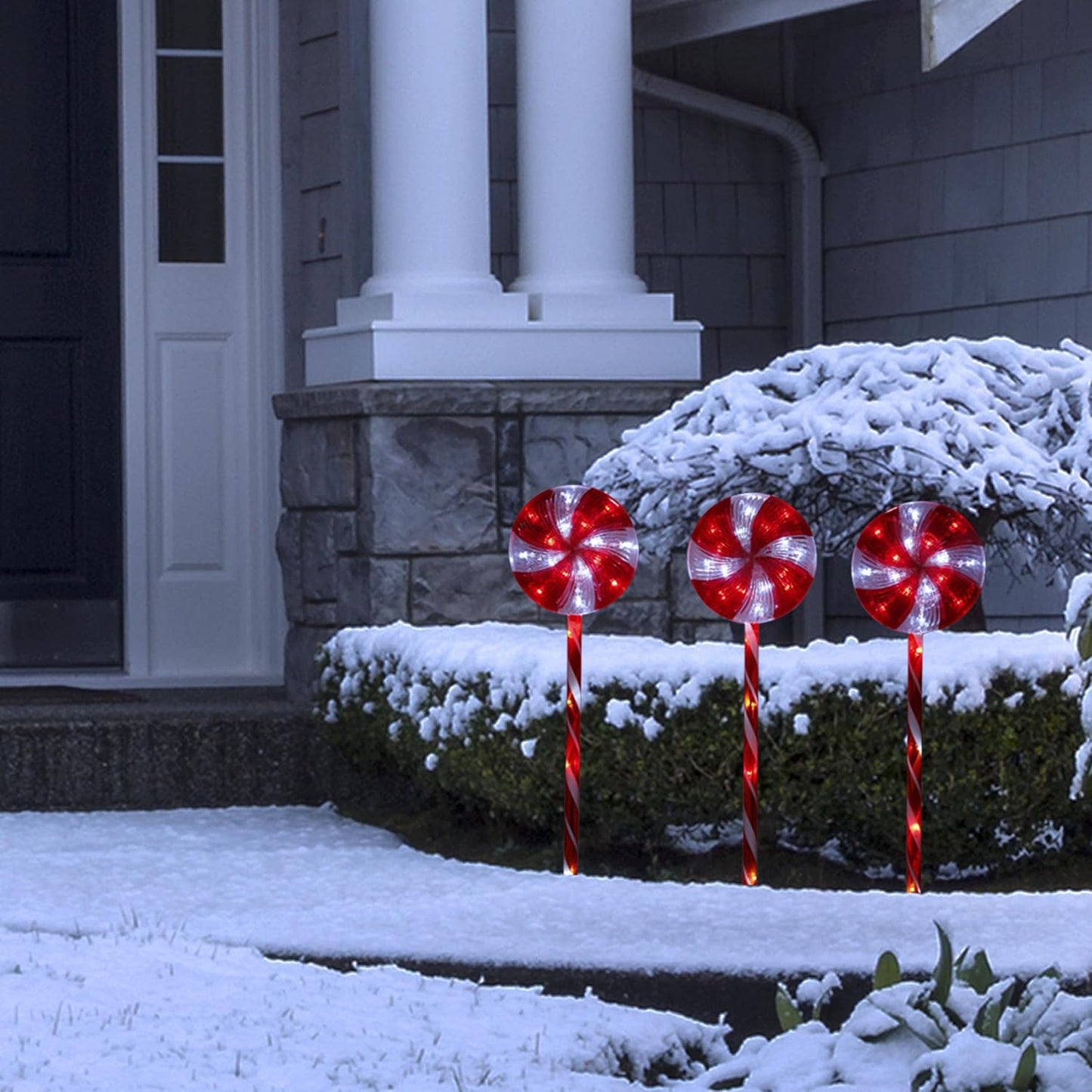 Alpine Corporation | 28" H Outdoor Candy Cane Pathway Christmas Stakes — Set of 3 with Multi-Function Red & White LED Lights — Festive Holiday Yard Decor