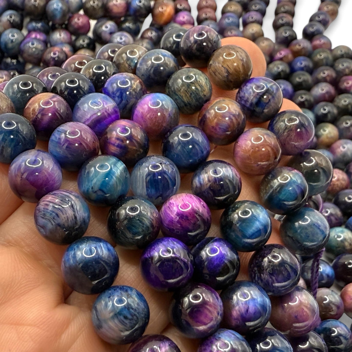ABCGEMS High-Flash Galaxy Tiger Eye Beads from Africa (Blend of Blue & Purple Hues that Mimic The Beauty of The Galaxy) Smooth Round 10mm